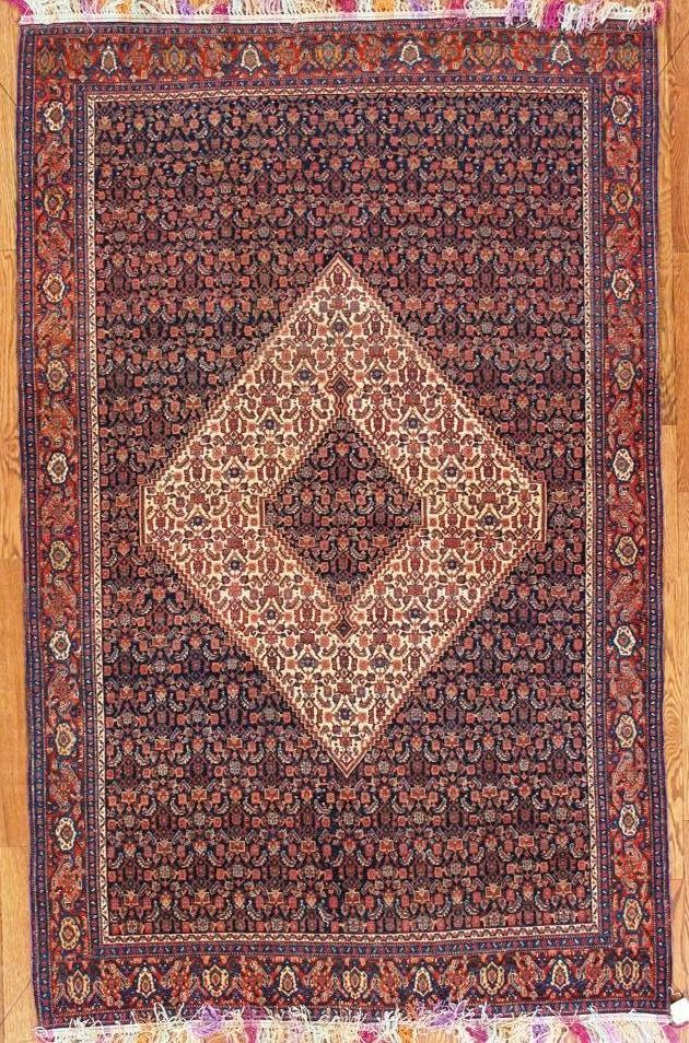 antique senneh with 7-coloure silk foundation rug