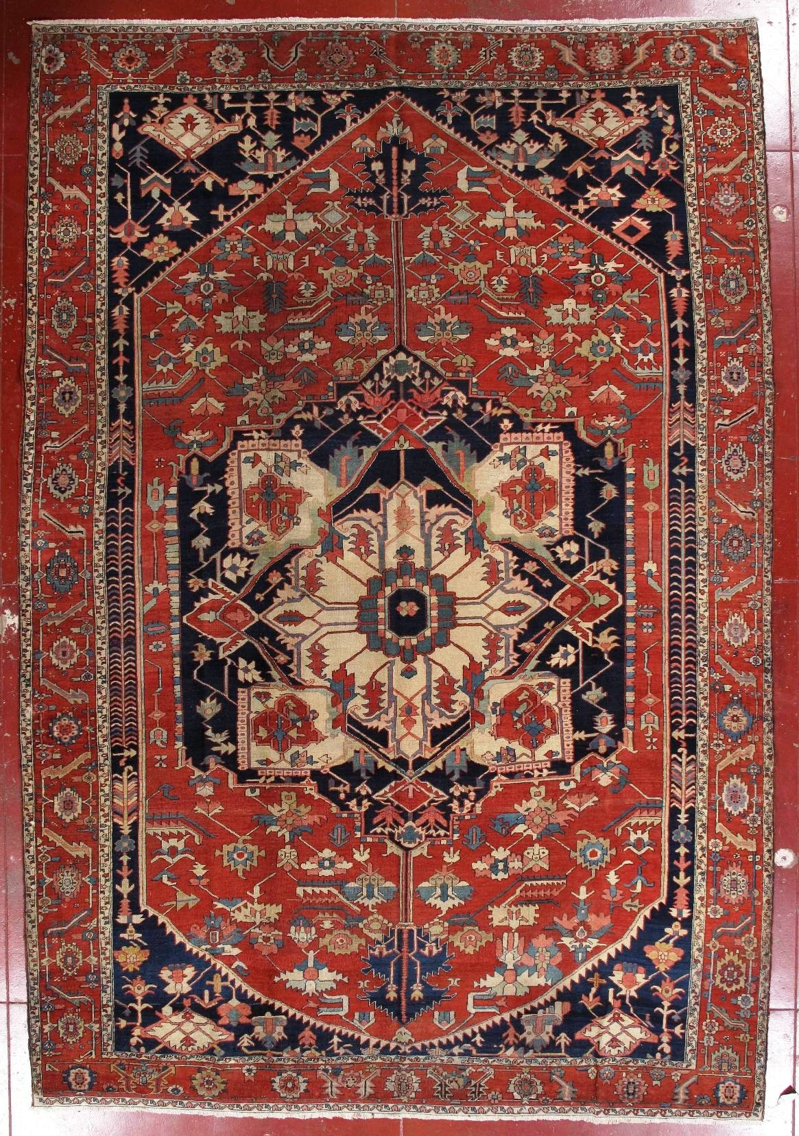 antique serapi carpet