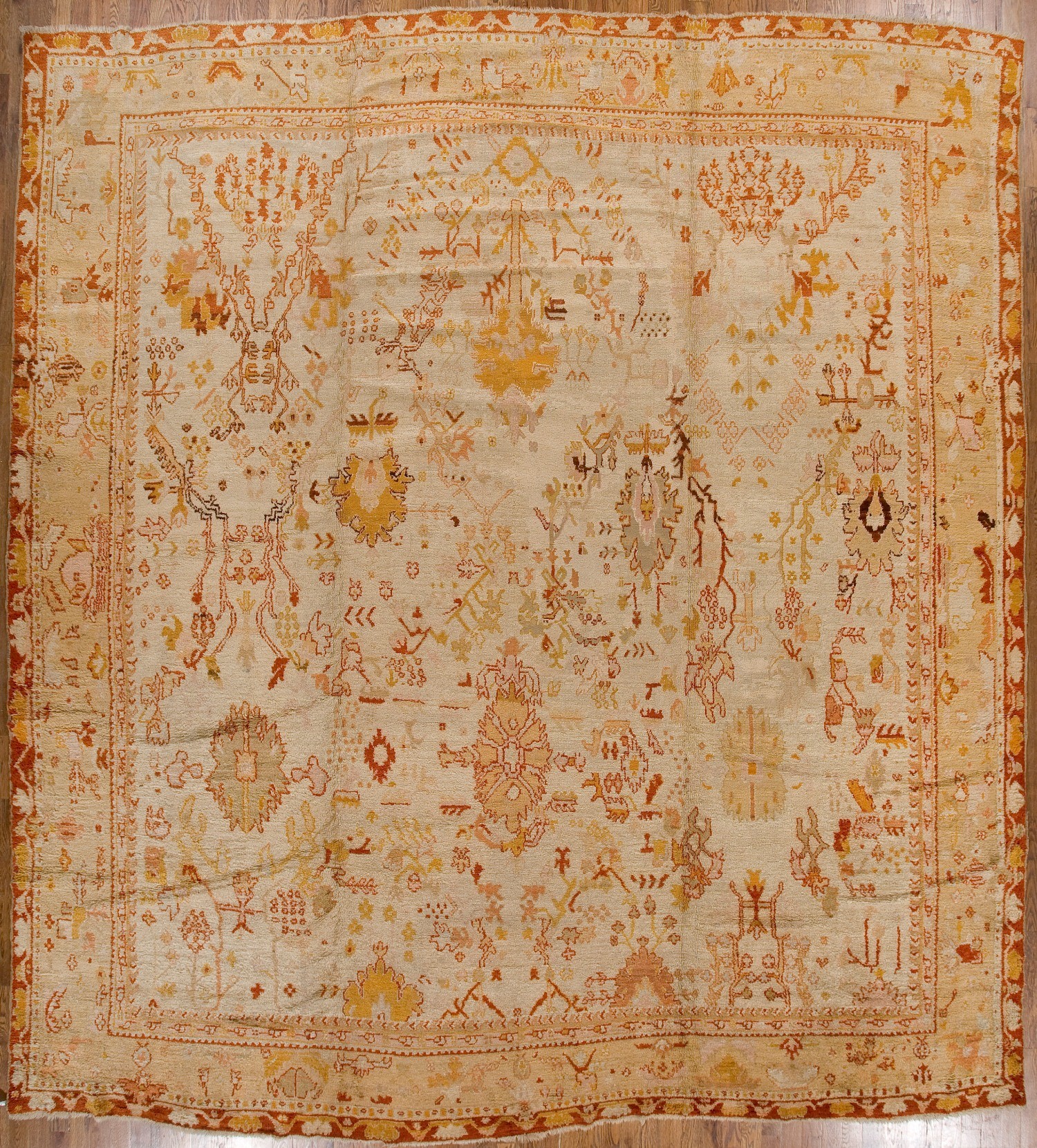 AN ANTIQUE OUSHACK RUG 