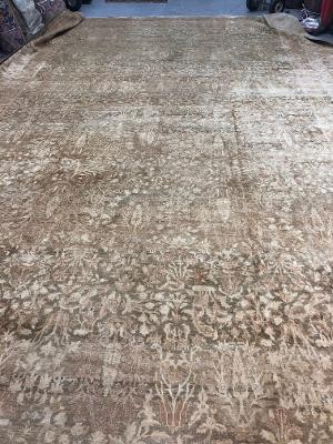 AN ANTIQUE INDIAN RUG