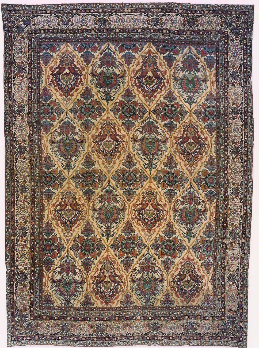 AN ANTIQUE LAVAR RUG