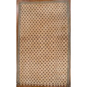 AN ANTIQUE DHURRIE RUG