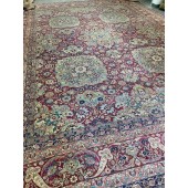 AN ANTIQUE LAVAR RUG