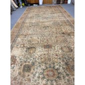 AN ANTIQUE AGRA RUG