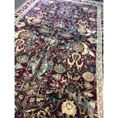 AN ANTIQUE AGRA RUG